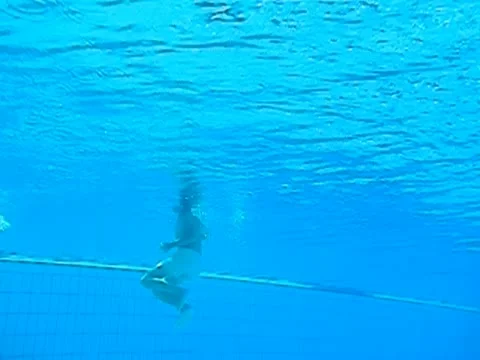 People in pool. Slow motion. Stock Footage 12031127