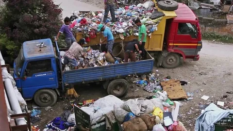 People from poorer areas working in sorting on the dump Stock Footage 75575172
