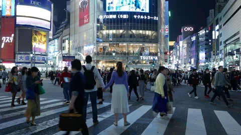 People posing and make photos at Shibuya pedestrian scramble, Tokyo Stock Footage 100367260
