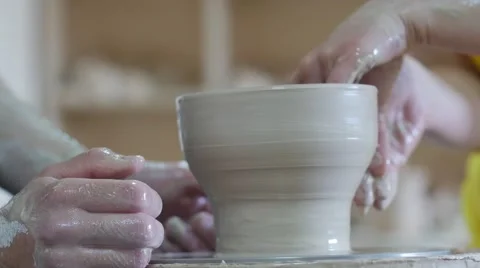 People at Pottery Master Class Are Molding a Clay Vessel in Workshop Hands Stock Footage 57994834