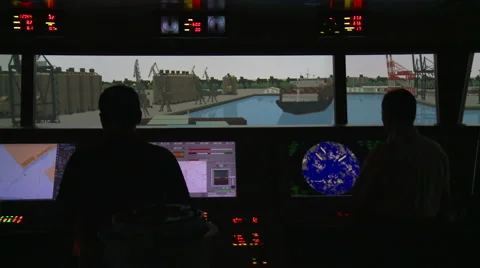 People practicing on the ship maneuvering simulator. Port of Kaohsiung, Taiwan. Stock Footage 66446652
