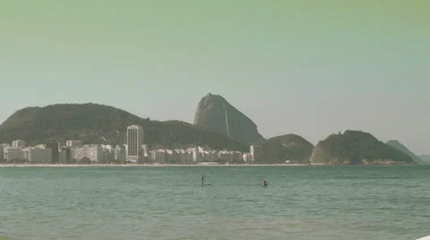 People practicing Stand Up Paddle in the Copacabana Beach Stock Footage 34425488