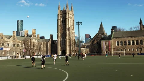 People practising soccer in Back Campus, University of Toronto, Hart House Stock Footage