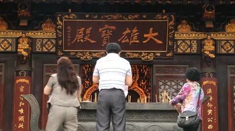 People pray at the Big Wild Goose pagoda in Xian, China. Stock Footage 64943653