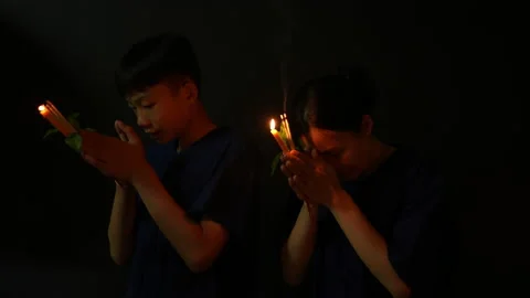 People pray in dark background of religious  Stock Footage 238769909