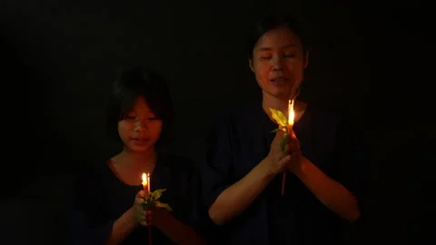 People pray in dark background of religious  Stockbeeldmateriaal 238770235