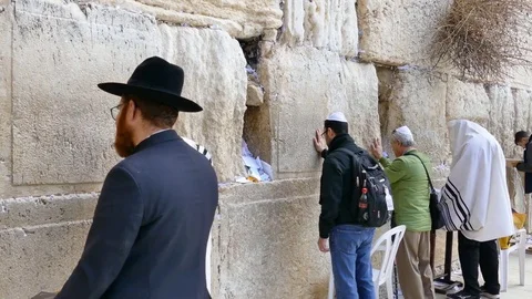People pray at the western wall, Jerusalem - Israel Stock Footage