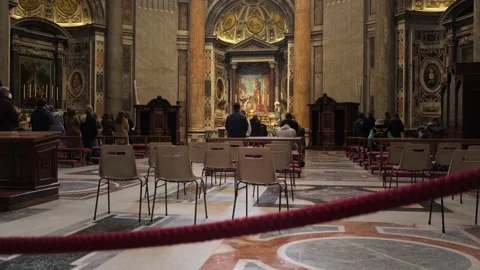 People praying in the church of Saint Peter, Vatican. Stock Footage 198740448