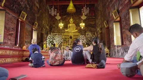 People Praying inside Buddhist Temple Shrine - Bangkok Stock Footage 101458642