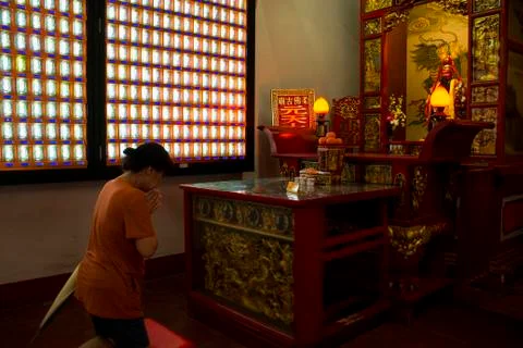 People praying inside the temple during CNY. Stock Photos