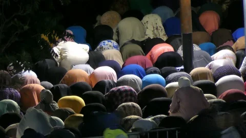 People praying out of Marrakech mosque during ramadam, Africa in 4K Stock Footage 93896323