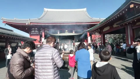 People praying at Sensoji Temple, Oldest temple in Tokyo Stock Footage 155779141