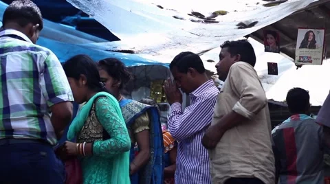 People praying before temple India Stock Footage 49987237