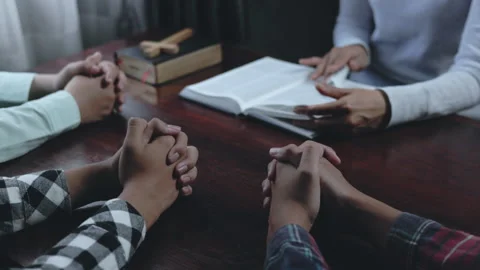 People praying together during a prayer meeting. Religious faith, worship, .. Stock Footage 336931934