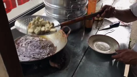 People prepare batagor. Stock Footage 236583732