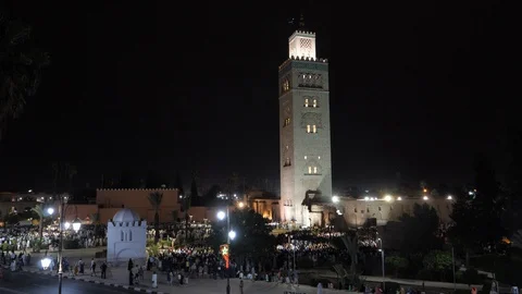 People prepare to pray out of Marrakech mosque during ramadam, Africa in 4K Stock Footage 93904050