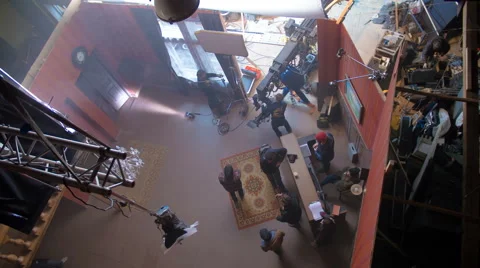 The people prepare to shot a film inside the studio. Time lapse. Wide angle Stock Footage