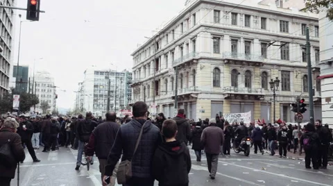People protest on the streets during the general strike in Greece Feb 2016 Stock Footage 59906482