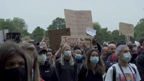 People protesting for George Floyd at a Black Lives Matter Peaceful Rally Stock Footage 131996632