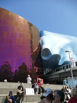 People protesting outside MoPOP, Museum of Pop Culture in Seattle, with mon.. Stock Photos