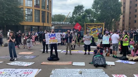 People protesting outside Tate Modern in London about their jobs Stock Footage 137608233