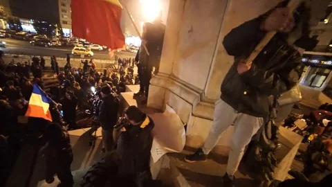 People protesting on statue Stock Footage 90126496