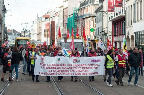 People from public service protesting with flags Stock Photos