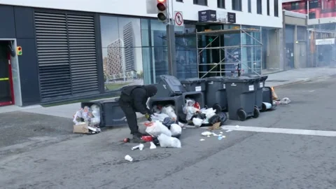 People putting garbage in fire du demonstration Stock Footage 132585897
