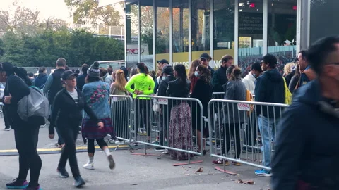 People que in long lines for the 50th running of the New York City Marathon Stock Footage 166329137