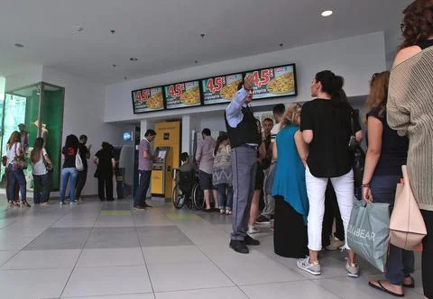 People Queue at Atm to Withdraw Money in Athens - Jun 2015 Stock Photos