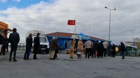 People queue to board public transport Stock Footage 210220065