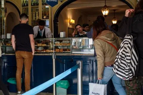 People in queue to buy the famous Pasteis de Belem Stock Photos