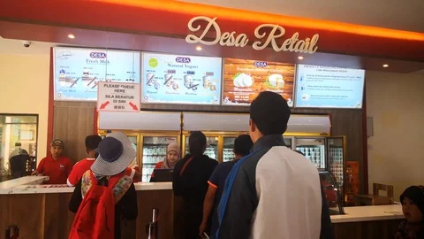 People queue on counter Stock Footage 114343587