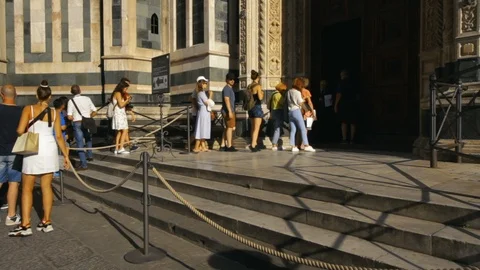 People in a queue to enter Duomo in Summer Season in Florence,Italy Stock Footage 111480082