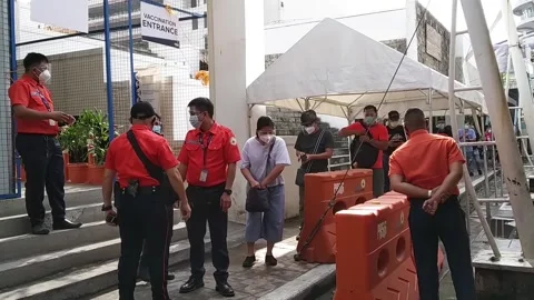 People in queue for free Covid Vaccination in Pasig City during pandemic Stock Footage 152810491