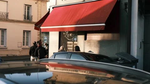 People queue in front of a bakery before the curfew at Vesinet Stock Footage 150702881