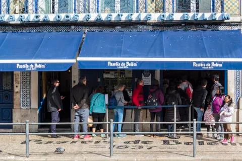 People queue in front of famous Pasteis de Belem bakery in Lisbon Stock Photos