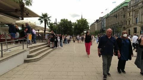 People in queue in front of popular restaurant during coronavirus pandemic Stock Footage 159283476