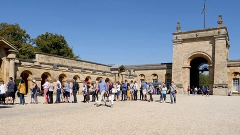 People in queue in the inner court yard at Blenheim Palace Stock Footage 95650636