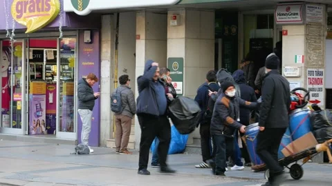 People queue lined up near ATM machine Video stock 168353301