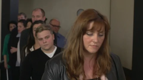 People Queue up or Waiting in line. Indoors. Queueing up. Stock Video Stock-Footage 128513941