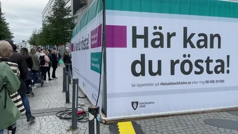 People in queue to polling station so they vote in the elections in Sweden Stock Footage 208949445