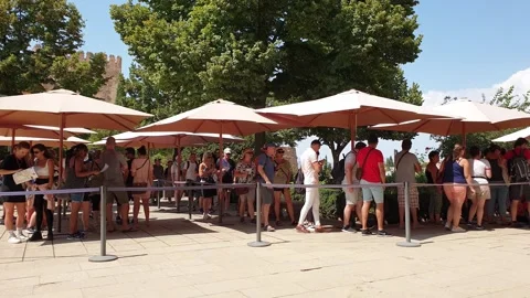 People queue for tickets in alhambra, granada, spain Stock Footage 280862274