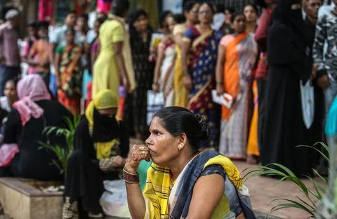People queue to withdraw their funds from PMC bank in Mumbai, India - 24 Sep 201 Stock Photos