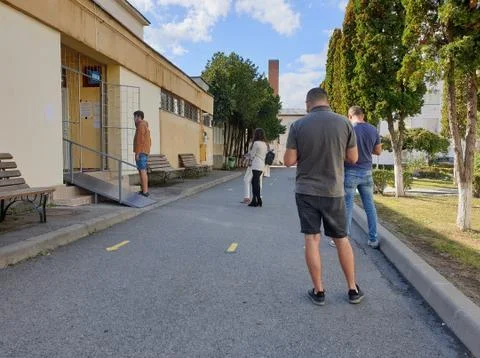 People queueing at local elections in Cluj-Napoca Stock Photos