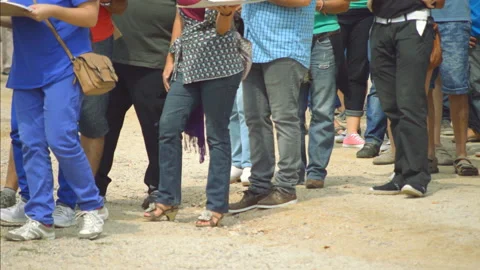 People Queueing on Soil 库存影片 99175661