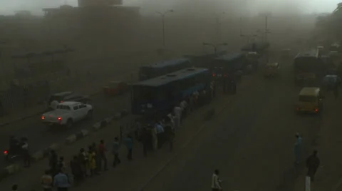 People queuing for buses in Lagos dust storm Stock Footage 38480741