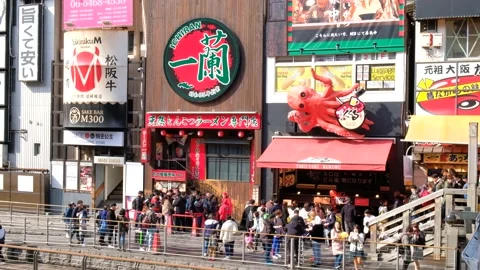 People queuing for ramen and octopus balls in Osaka, Japan Stock Footage 132608357