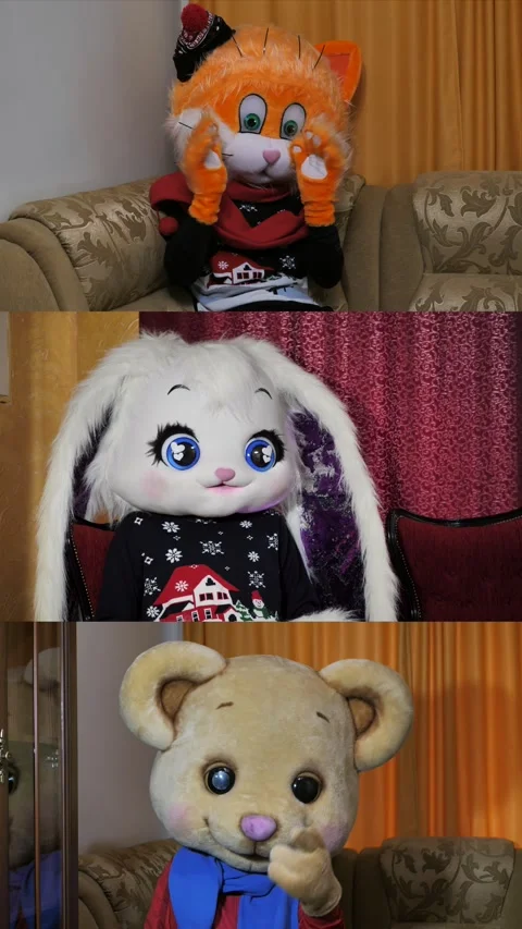 People in rabbit, cat, bear masks pose for the camera. online classes for Stock Footage 305203384