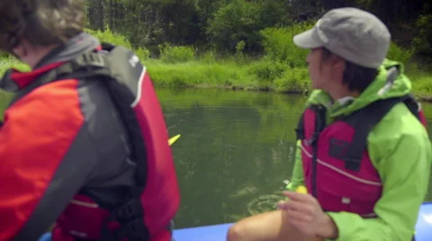 People in raft look around Stock Footage 59665214